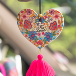 You Are So Loved Air Freshener | Natural Life | Spread the love with our You Are So Loved Air Freshener! Infused with Rose Musk-scented essential oil, this double-sided freshener not only adds a boho vibe with a yarn tassel and wooden bead, but it also brings a lovely scent to your car or personal space. Elastic string makes it easy to hang anywhere.
Scent: Rose Musk-scented essential oil
Pressed paper with essential oils and natural and artificial preservatives, exclusive of trim. Phthalate free