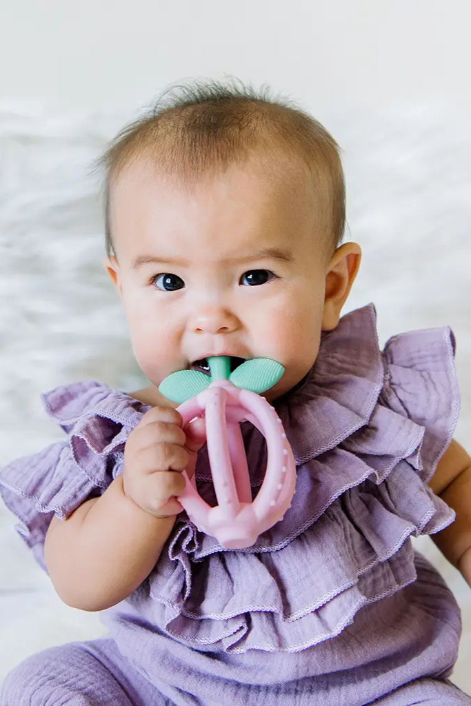 Bitzy Biter™ Teething Ball + Training Toothbrush | Itzy Ritzy