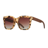 Tortoiseshell sunglasses with brown gradient lenses on a white background