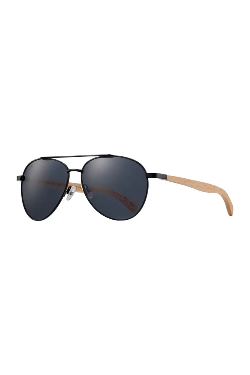 Sunglasses with dark lenses and wooden arms on a white background