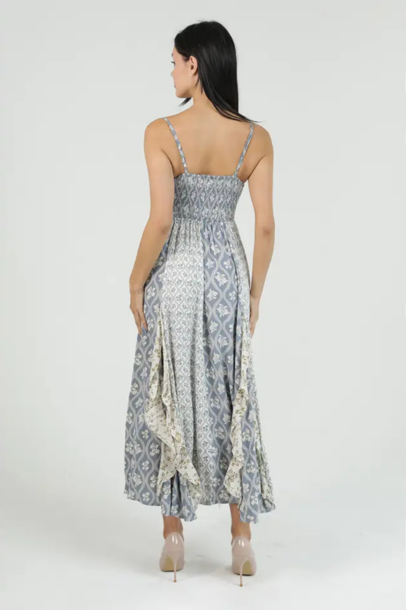 Woman wearing a floral dress with a white background