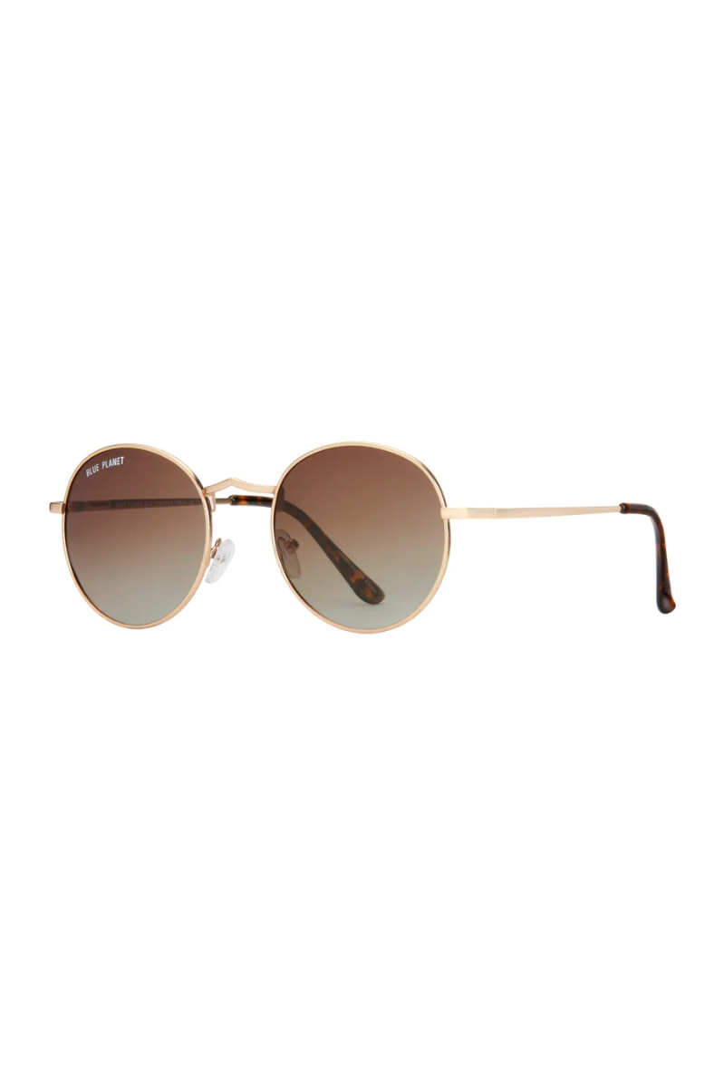 Round sunglasses with gradient lenses on a white background