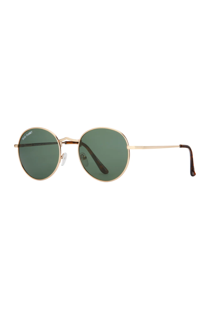 Round sunglasses with gold frame and green lenses on a white background