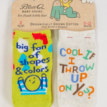 Two baby socks with humorous text on a Blue Q packaging label. 2 Pack saying: "Big Fan of Shapes & Colors", "Cool If I throw Up on You?"