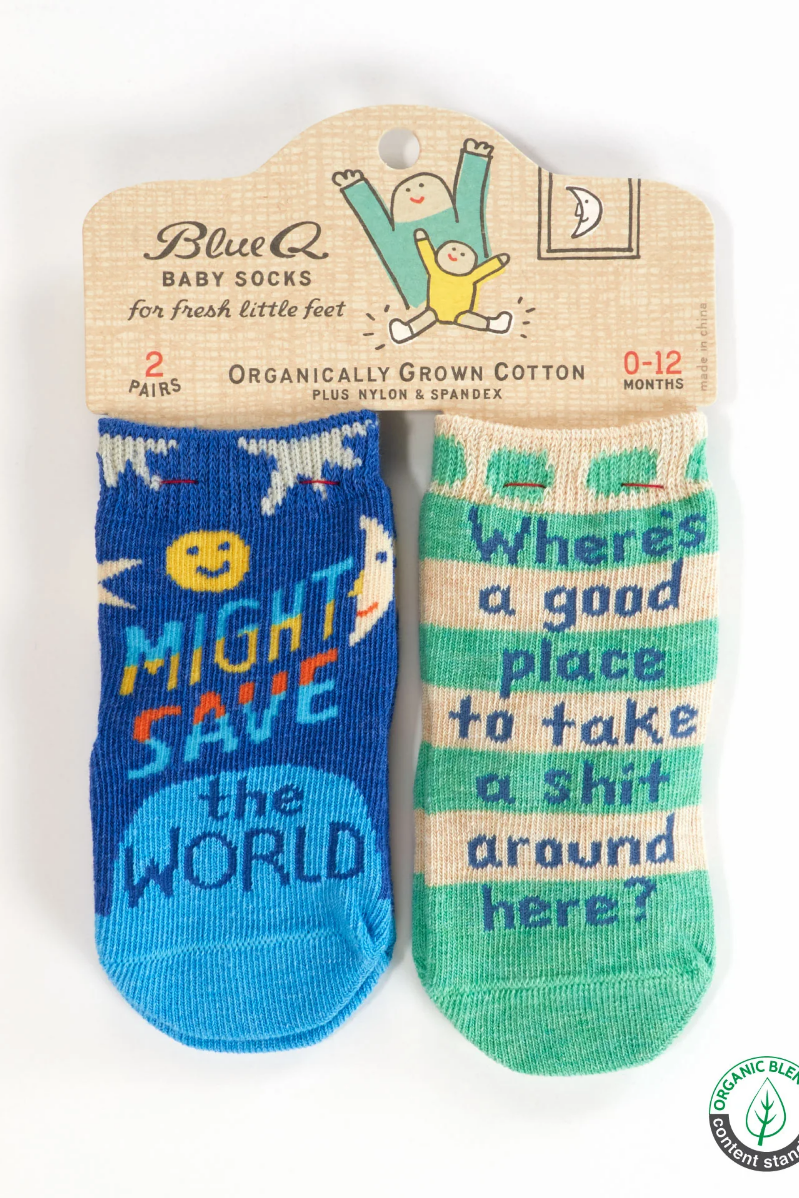 Two baby socks with humorous text on a Blue Q branded card. "Might Save the World" & "Where's a Good Place to Take a Shit Around Here?" Baby Socks