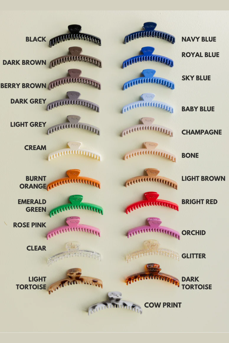 Collection of hair clips in various colors on a white background. Shiny Midi Hold Everything Claw | KAXI