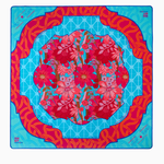 Colorful Tile/Game mat in a floral design on a blue background with red border. Delilah Mat in Tube | Oh My Mahjong