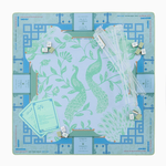 Placemat with dragon design on a blue background