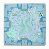 Placemat with dragon design on a blue background