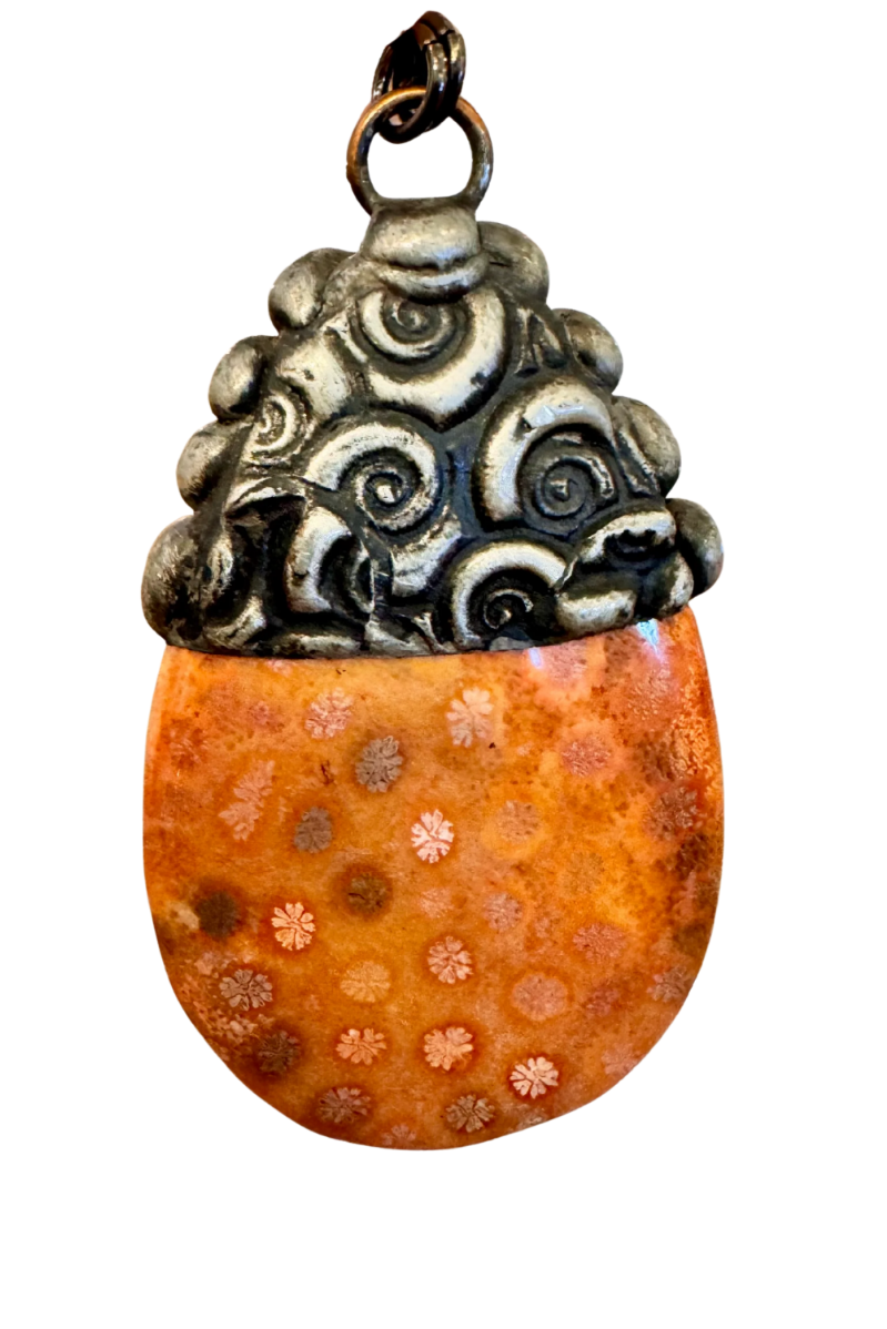 Pendant with orange base and silver top on a white background