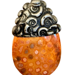 Pendant with orange base and silver top on a white background
