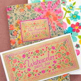 Floral-themed greeting cards on a pink background