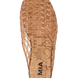 Cork sandal with woven design on a white background