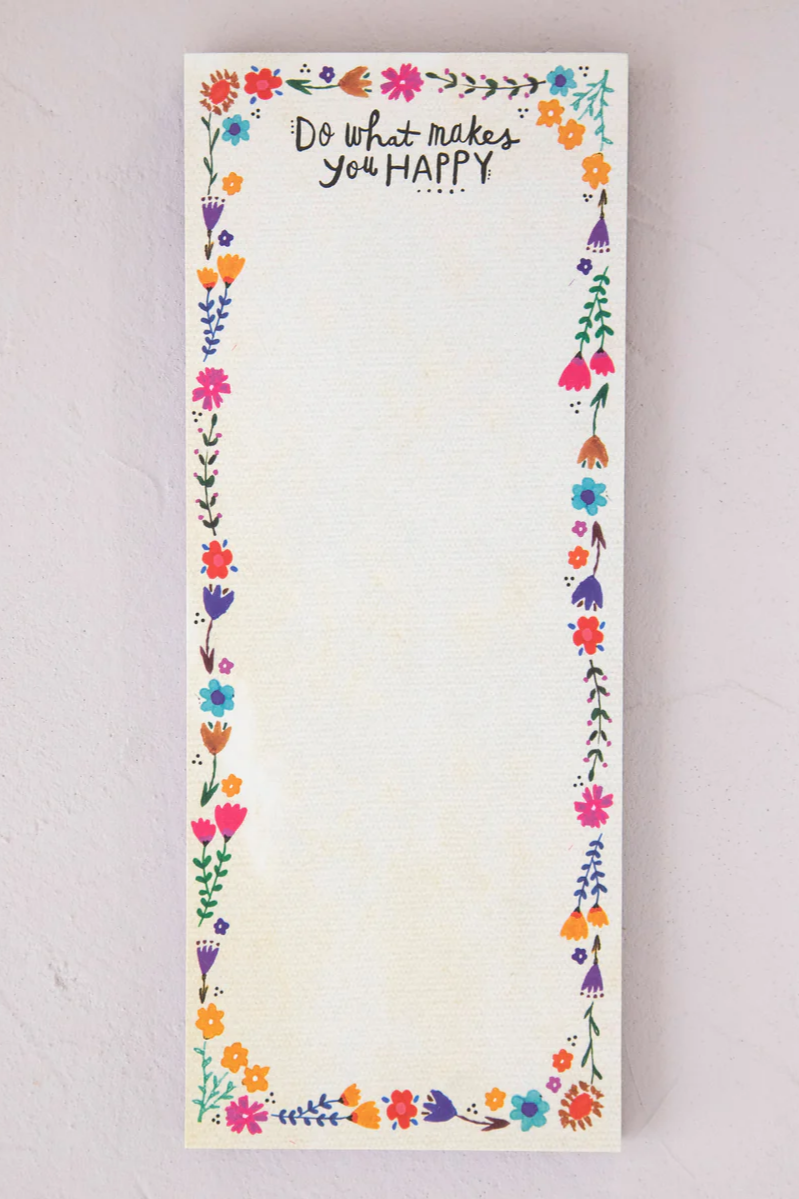 Notepad with floral border and motivational quote on a light background
