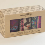 Box of boho sock set with visible design on a beige background