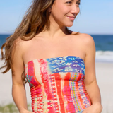 Woman wearing a colorful strapless top and jeans on a beach Full Boho Bandeau® Headband | American Flag