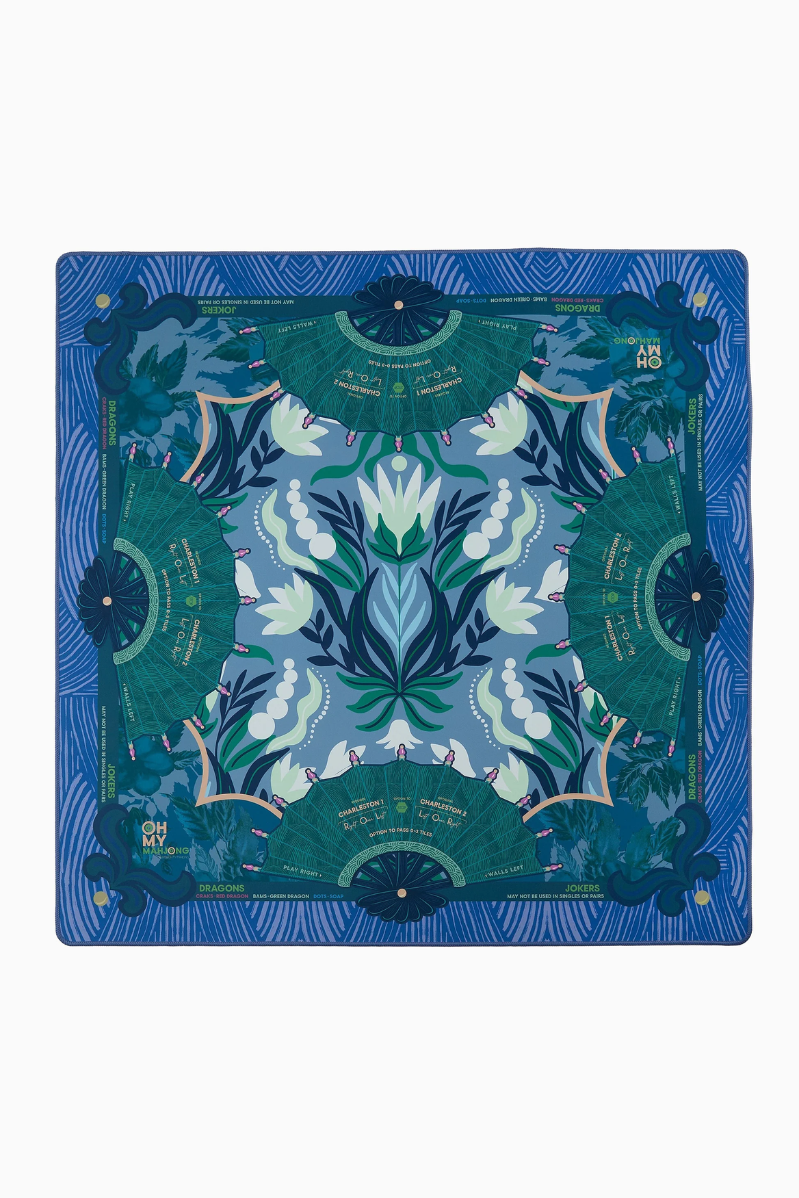 Decorative blue and green patterned product on a white background. Jade Mat in Tube | Oh My Mahjong