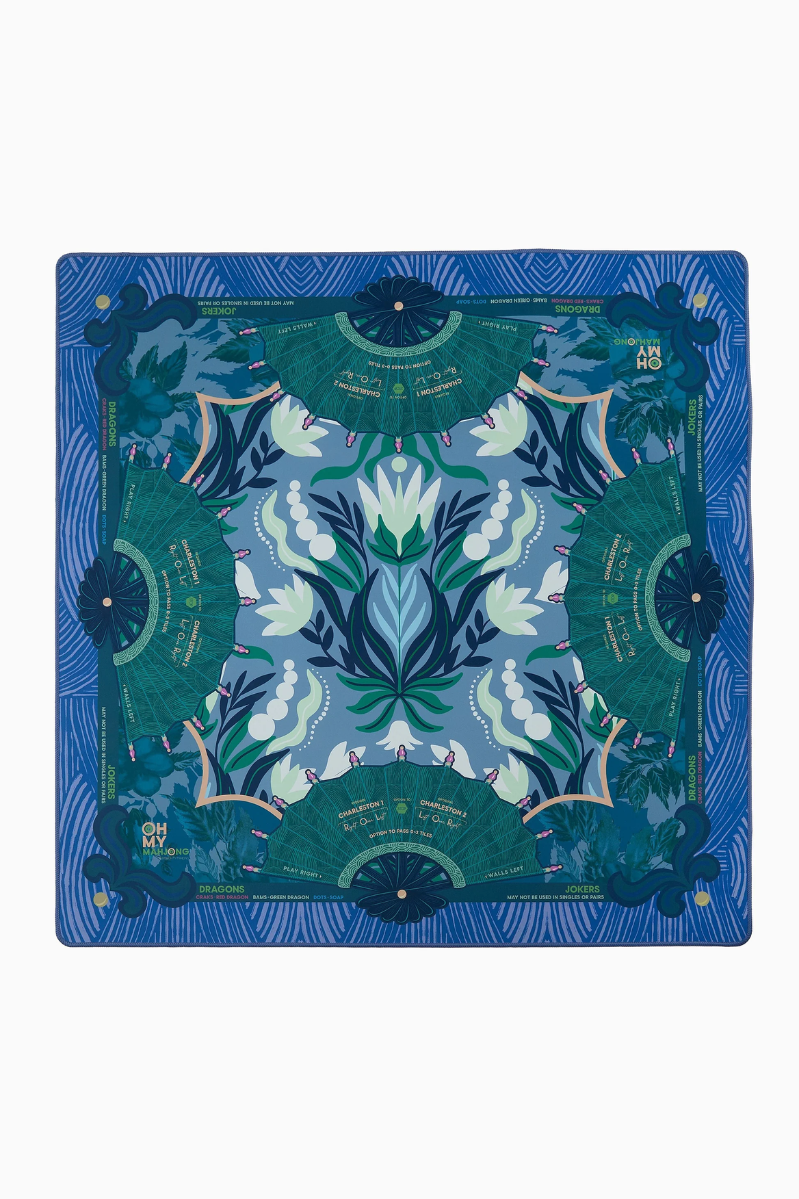 Decorative blue and green patterned product on a white background. Jade Mat in Tube | Oh My Mahjong