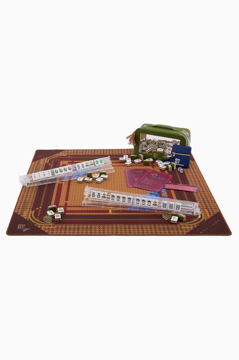 Board game set with pieces and components on a white background