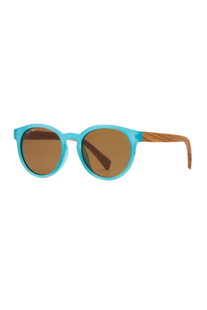 Sunglasses with turquoise frame and brown lenses on a white background