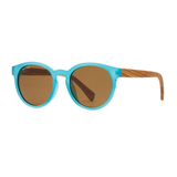 Sunglasses with turquoise frame and brown lenses on a white background