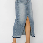 Denim skirt with a high slit worn by a person on a white background