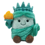 Toy resembling the Statue of Liberty on a white background