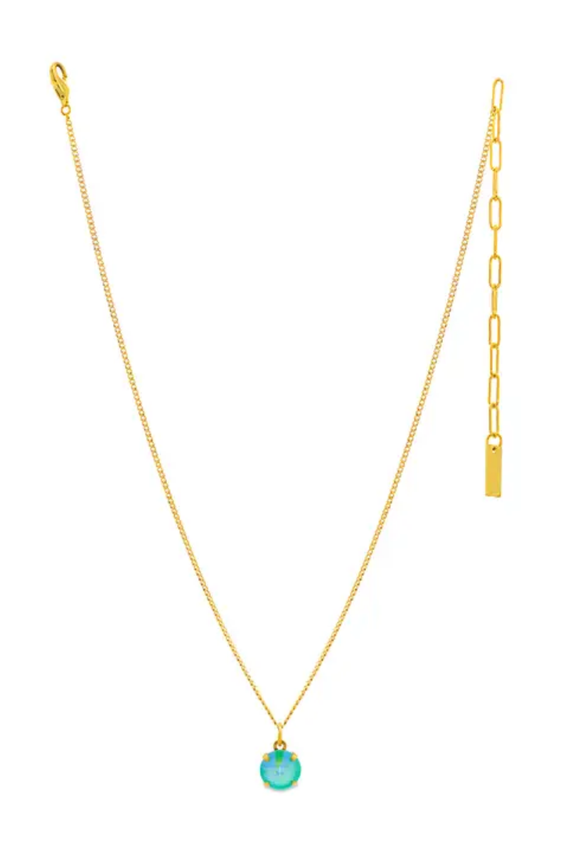 Gold necklace with a turquoise pendant on a white background