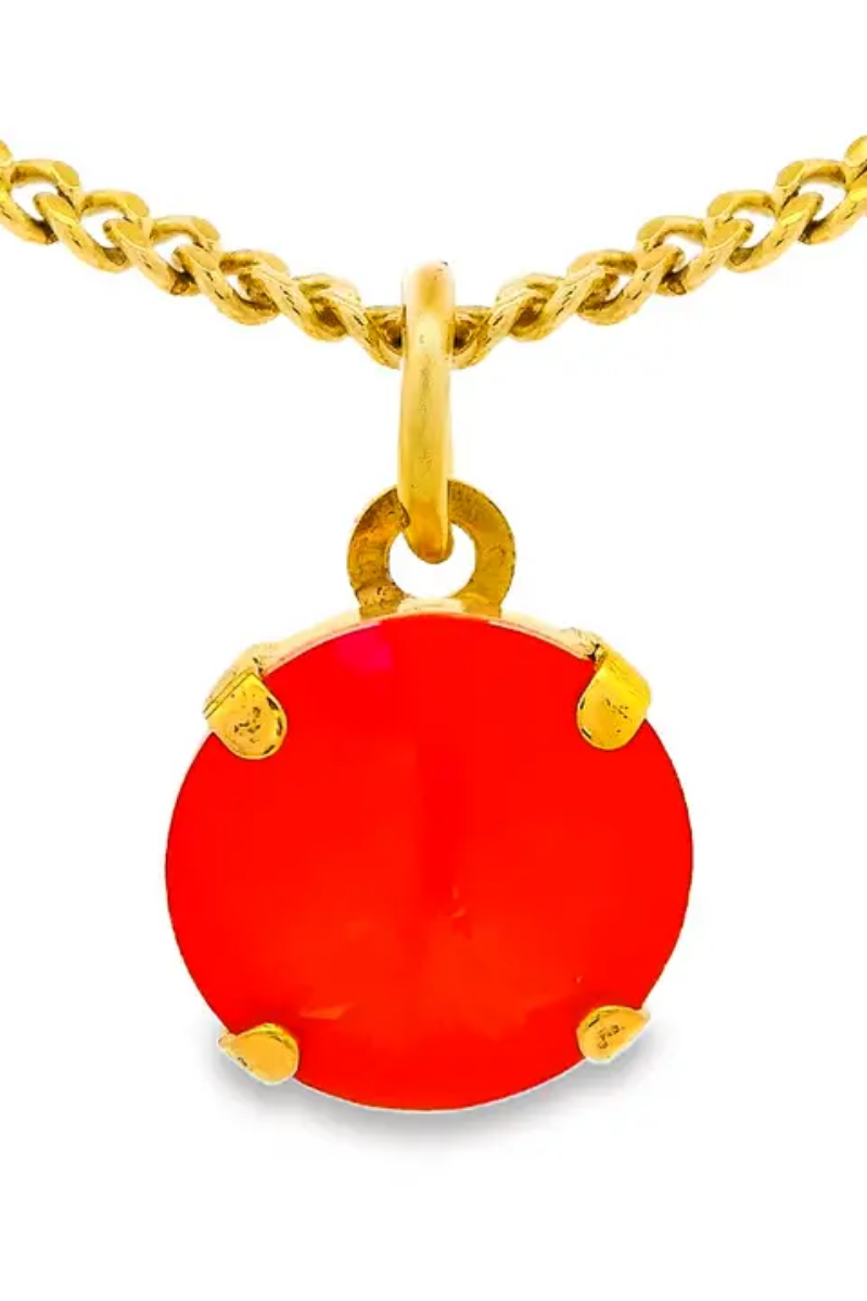 Gold necklace with a red pendant on a white background. Talia Necklace in Candy Crush| TOVA