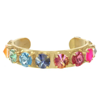 Gold bracelet with colorful gemstones on a white background