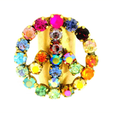 Multicolored jeweled peace sign on a white background