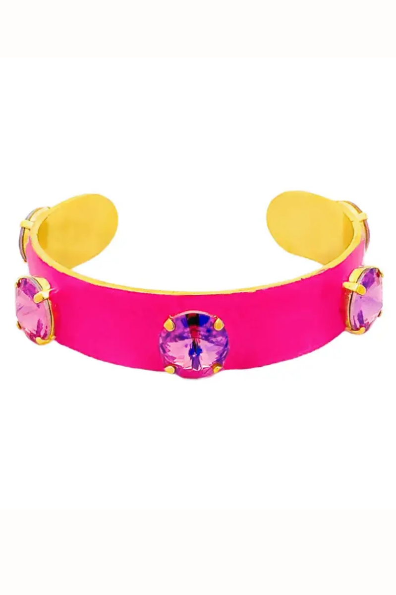 Pink bracelet with yellow accents and colorful gemstones on a white background