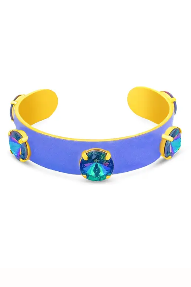 Blue and yellow bracelet with colorful gemstones on a white background