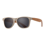 Sunglasses with wooden frame and dark lenses on a white background