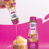 Skinny Mixes Salted Caramel sauce being poured into a coffee cup with a pink background