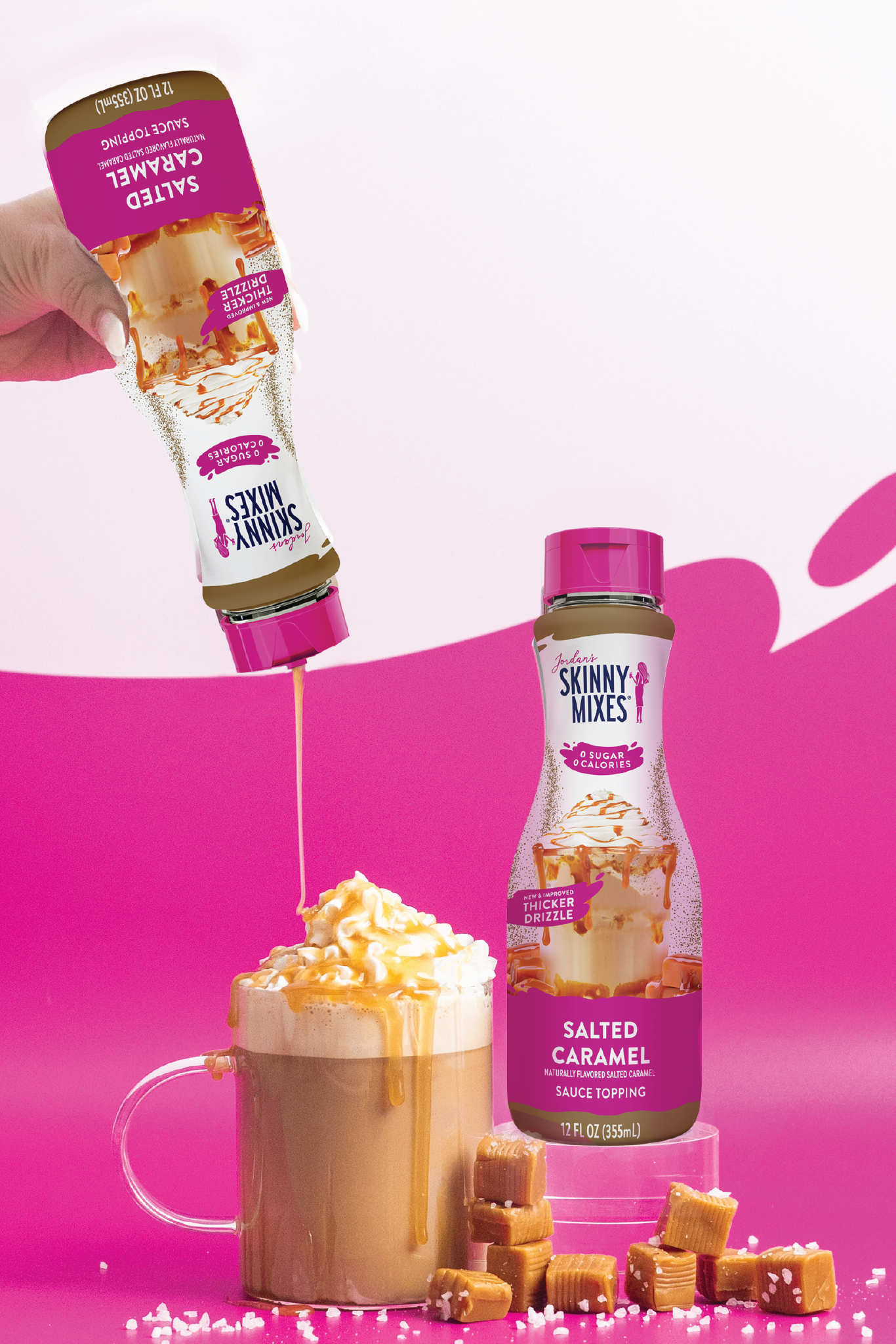 Skinny Mixes Salted Caramel sauce being poured into a coffee cup with a pink background