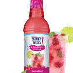 Skinny Mixes raspberry syrup bottle with a glass of raspberry juice on a white background