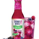 Skinny Mixes Wild Berry drink mix bottle with a glass of mixed berry drink and berries on a white background