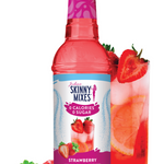 Bottle of Skinny Mixes strawberry syrup with a glass of strawberry drink and strawberries on a white background