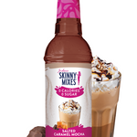 Bottle of Skinny Mixes Salted Caramel Mocha syrup with a glass of coffee and toppings on a white background