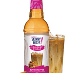 Skinny Mixes Butter Toffee syrup bottle with a glass of syrup and pretzels on a white background